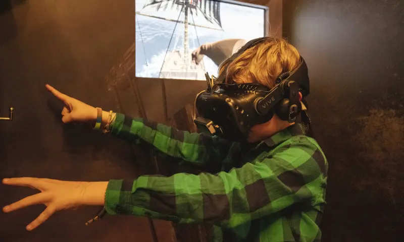 Deelnemer met VR rondleiding