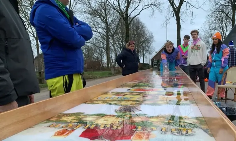 sjoelen met bierglas