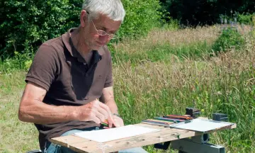 Demonstratie beeldhouwen in hout door Harm Echten